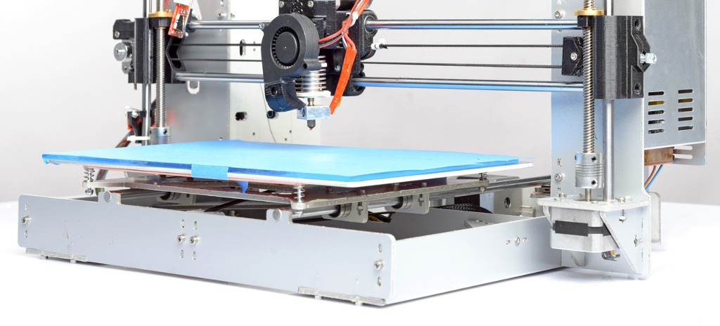 Photo of a modern grey 3d-printer ,three-dimensional